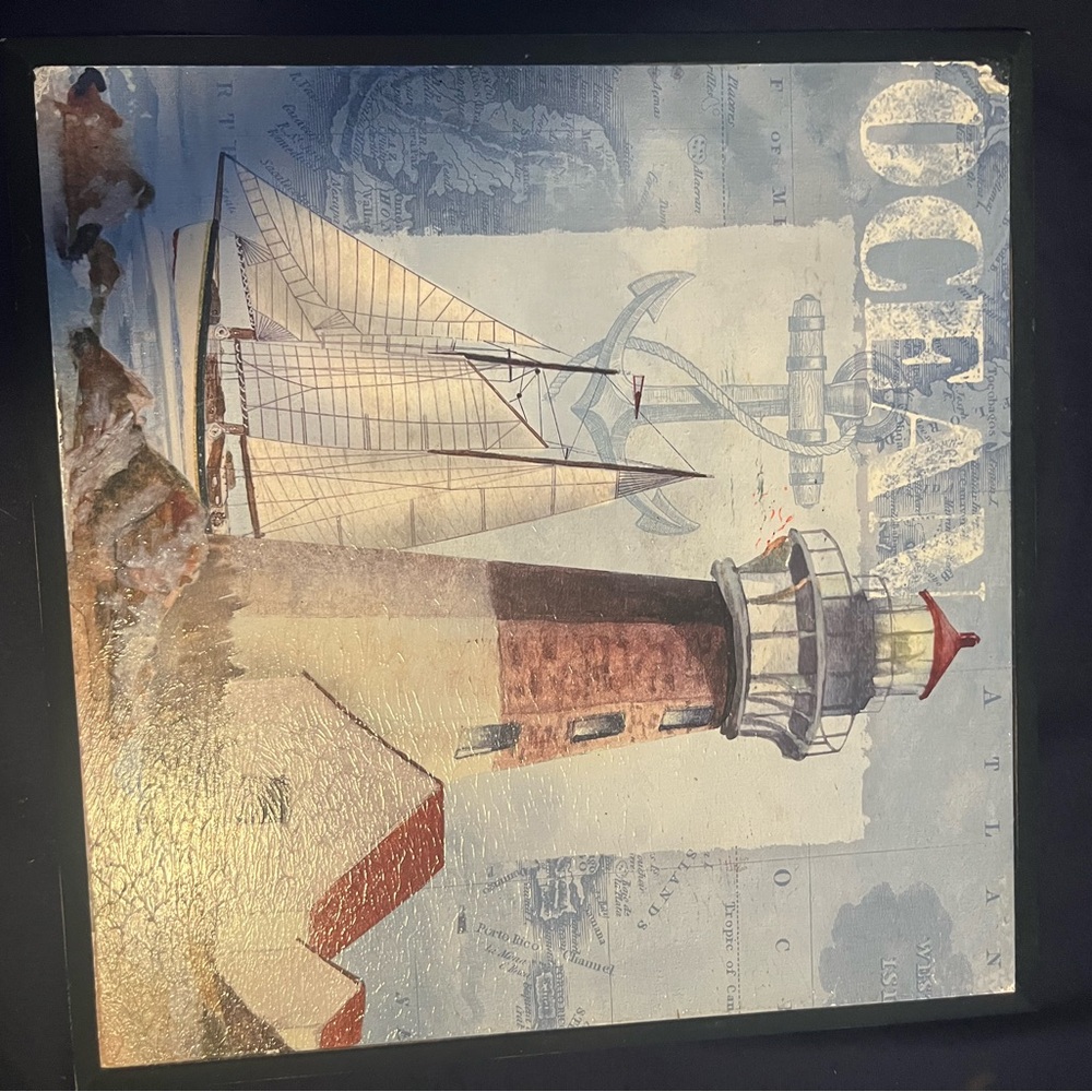 Kirklands Coastal Lighthouse and Sailboat Art in Blue and Red